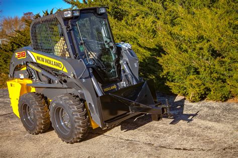 hauling a truck on a skid steer trailer|skid steer trailer moving attachment.